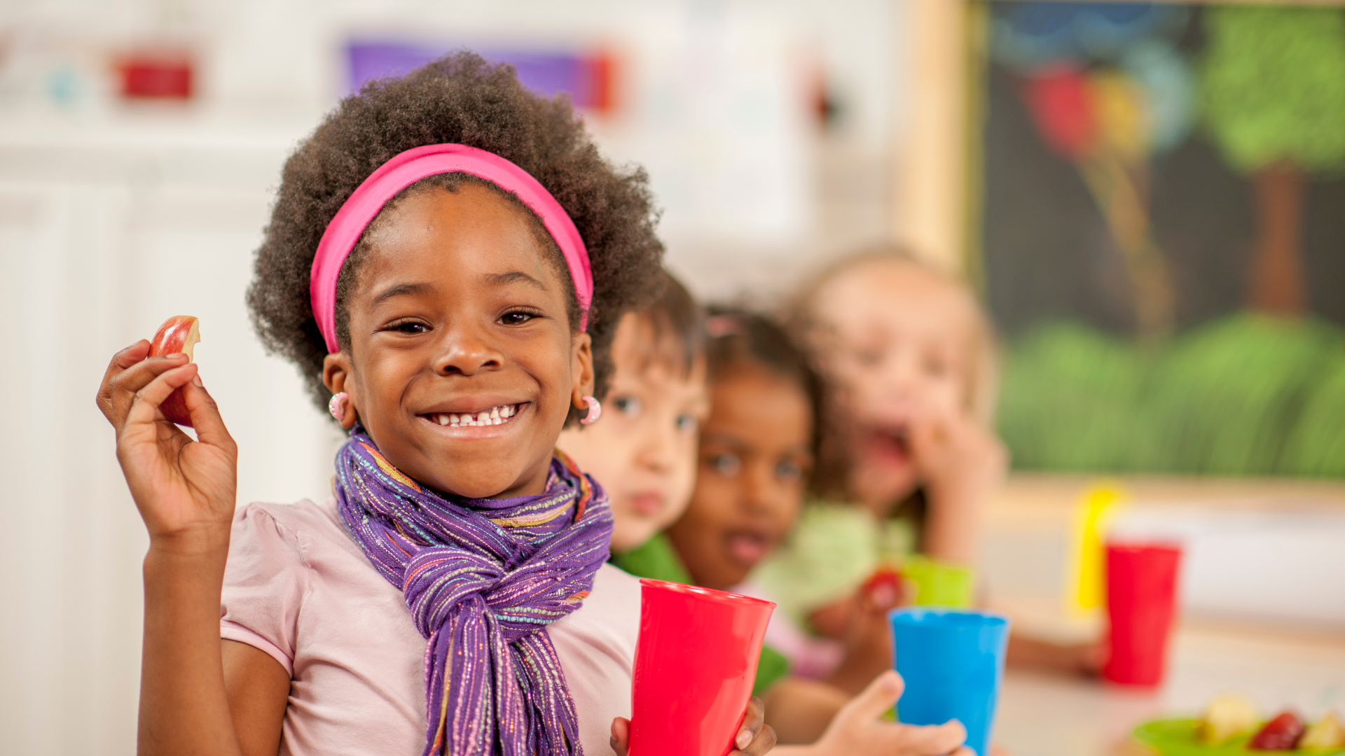 Children eating snacks - Storm Associates LLC